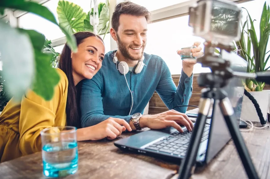 happy couple of bloggers recording and send video